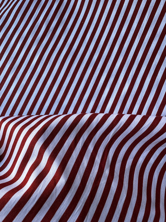 Tessuto a righe rosso/bruciato